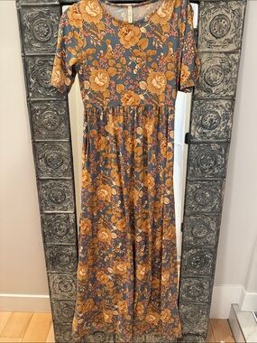 orange creek Slate Maxi Dress with Mustard Floral Print with pockets. Stretchy